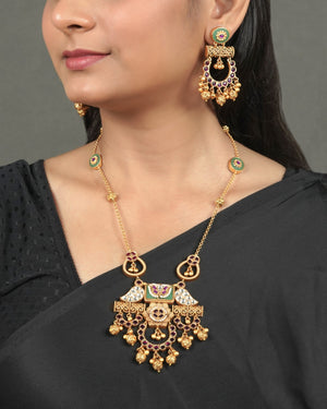 Antique Golden Heritage Pendant Set for Traditional Look styled in traditional golden jewellery display