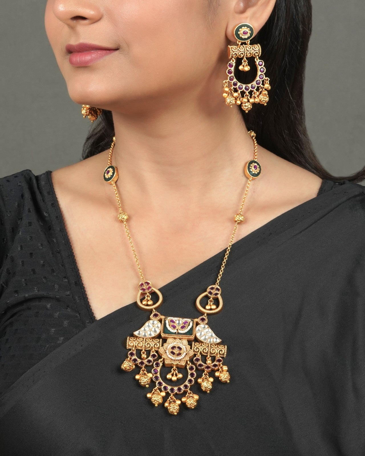 Antique Golden Heritage Pendant Set for Traditional Look styled in traditional golden jewellery display