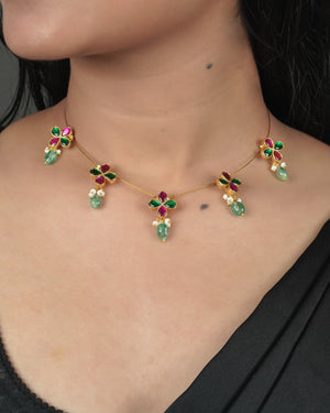 Gold tone Jadau Pachi Kundan necklace with warm traditional finish
