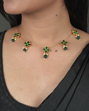 Gold tone Jadau Pachi Kundan necklace with warm traditional finish