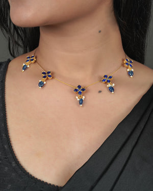 Gold tone Jadau Pachi Kundan necklace with warm traditional finish