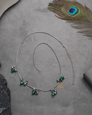 Green Classic kandora waist chain jewellery styled with traditional saree