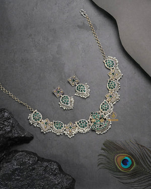 Festive antique necklace set with tribal charm for ethnic wear