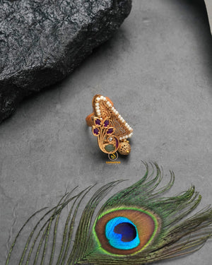 Ornate golden heritage ring with richly decorative silhouette
