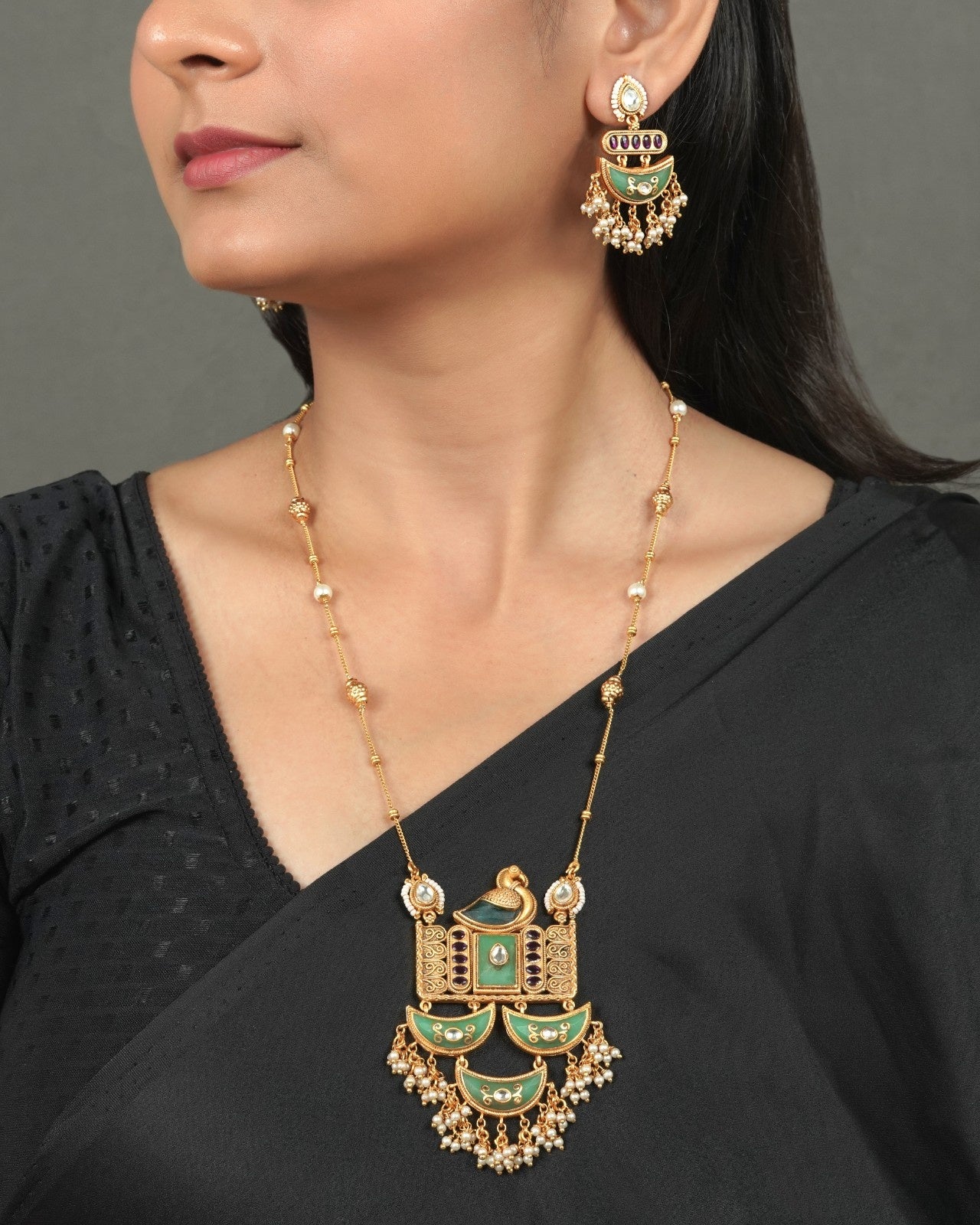Vintage Golden Heritage Pendant Set for Ethnic Fashion styled in traditional golden jewellery display