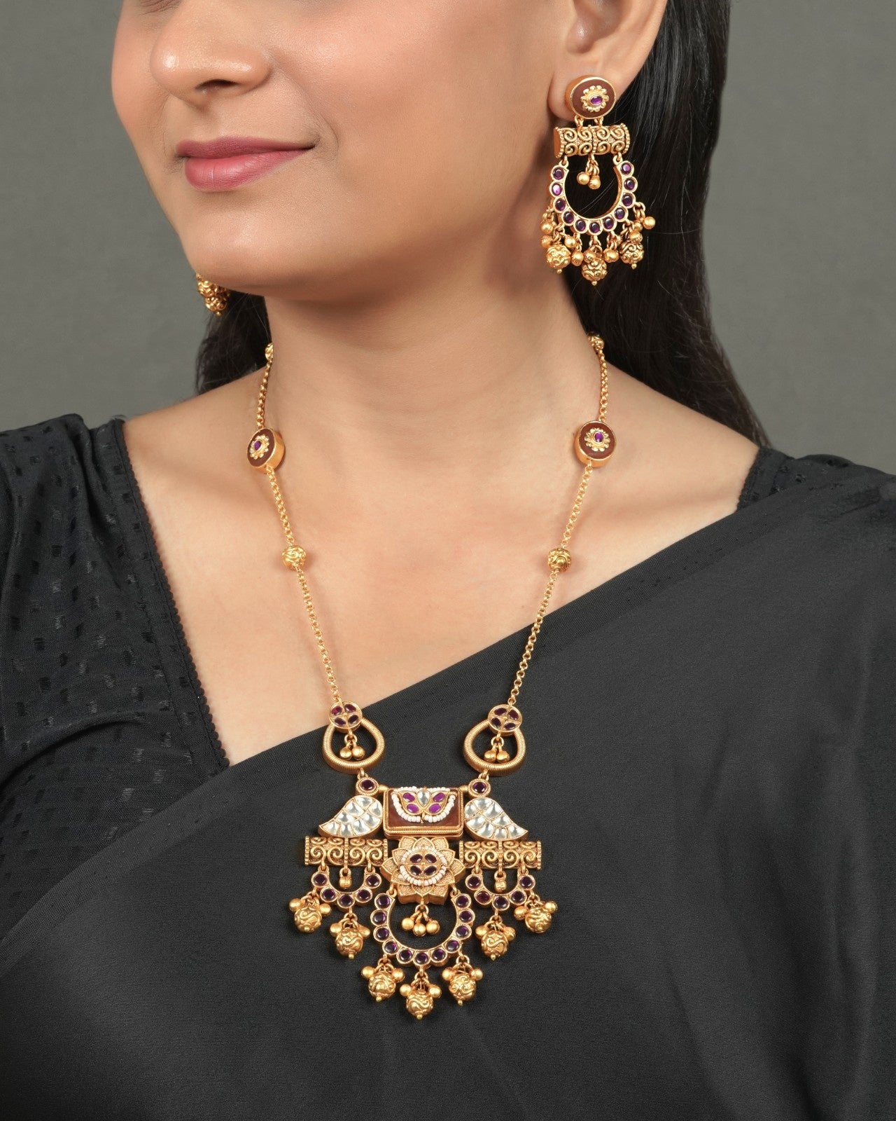 Antique Golden Heritage Pendant Set for Traditional Look styled in traditional golden jewellery display