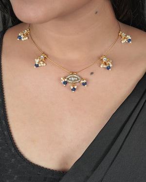 Red stone Jadau Pachi Kundan necklace for festive traditional wear