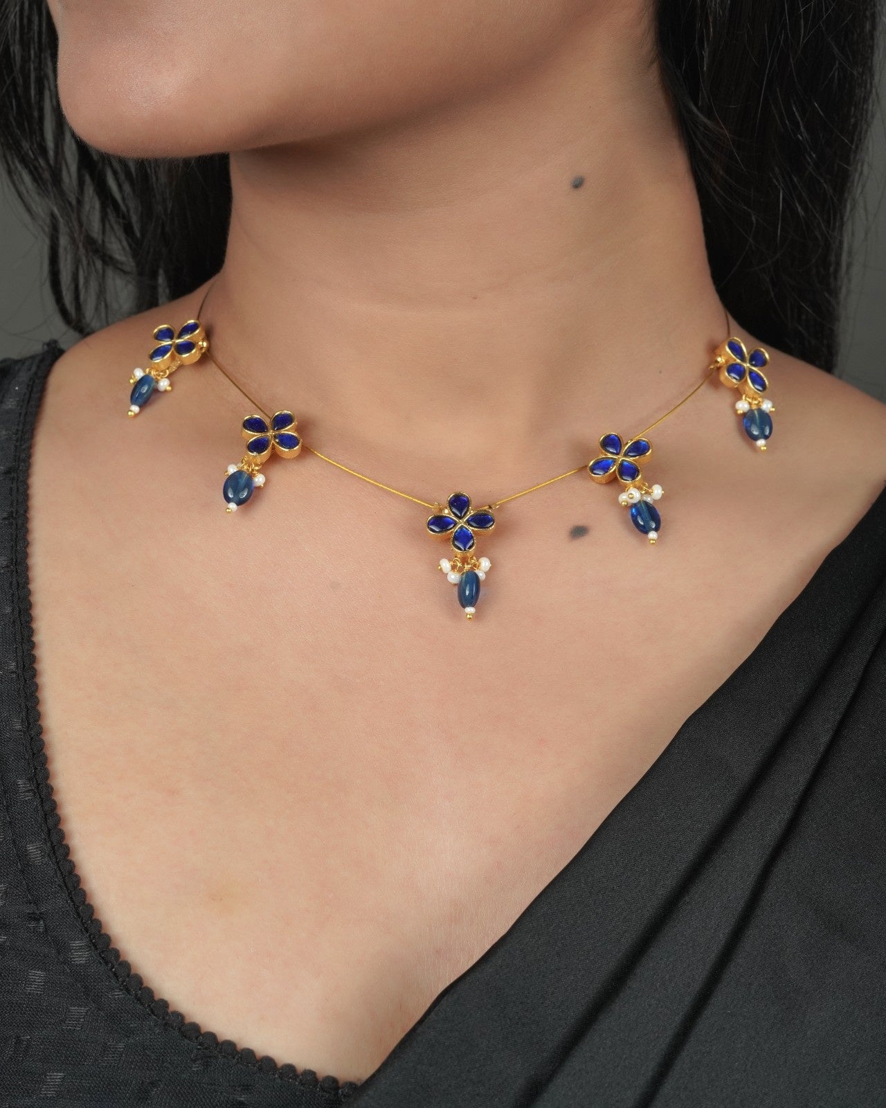 Gold tone Jadau Pachi Kundan necklace with warm traditional finish