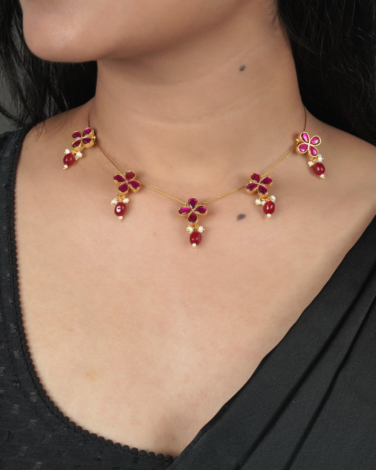 Gold tone Jadau Pachi Kundan necklace with warm traditional finish