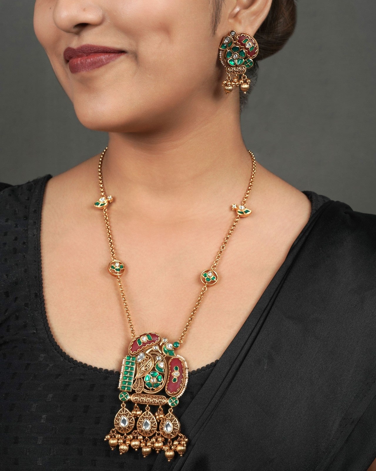 Classic Golden Heritage Pendant Set for Timeless Jewellery styled in traditional golden jewellery display