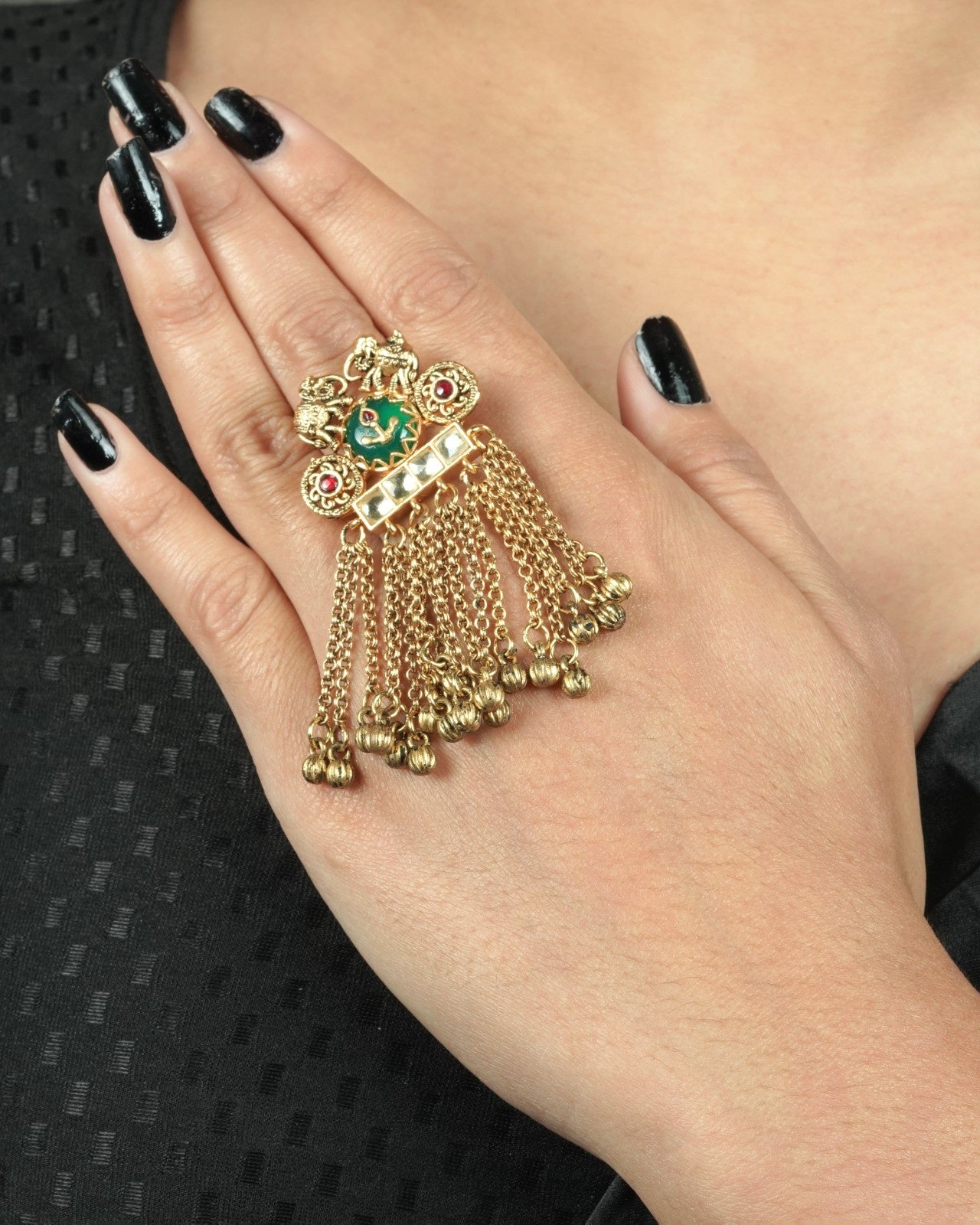 Statement golden heritage ring with bold traditional styling