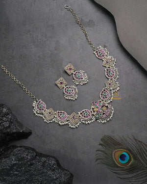Festive antique necklace set with tribal charm for ethnic wear