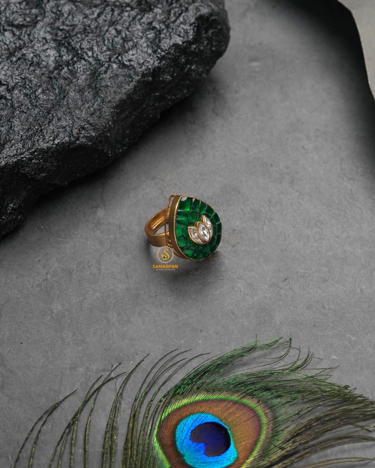 Festive golden heritage ring with celebratory traditional charm