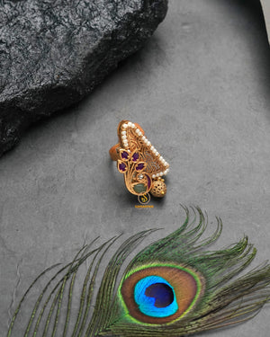 Ornate golden heritage ring with richly decorative silhouette