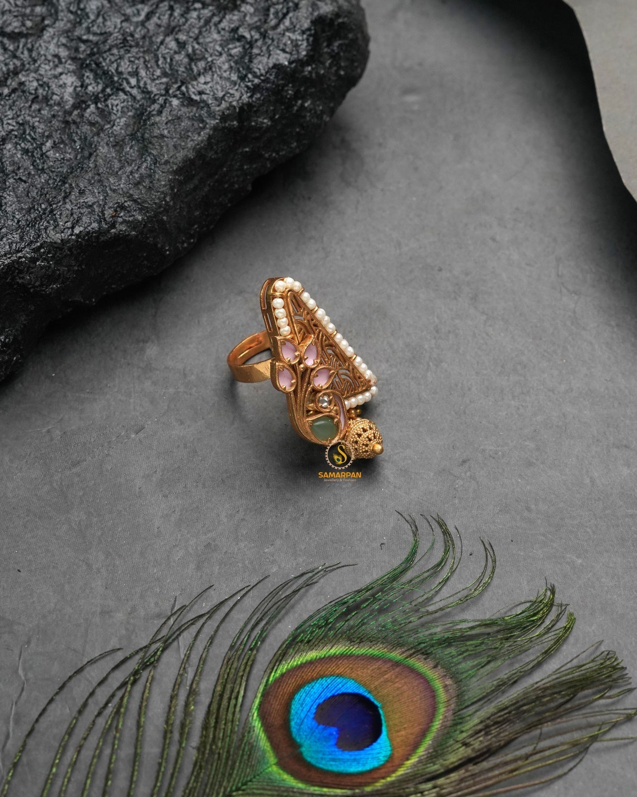 Ornate golden heritage ring with richly decorative silhouette