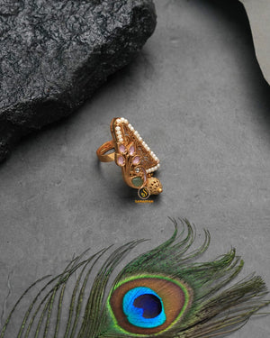 Ornate golden heritage ring with richly decorative silhouette