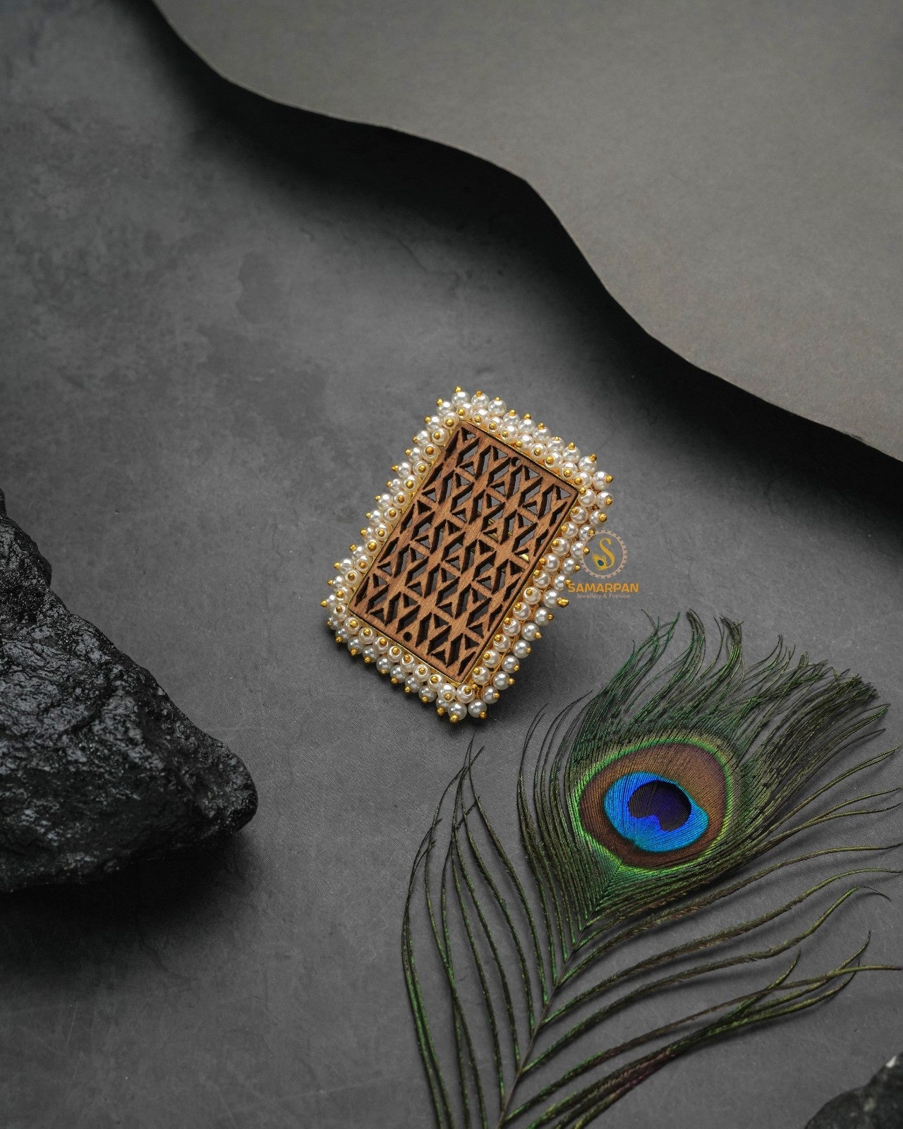 Bold metallic golden glow ring with assertive glamorous appeal