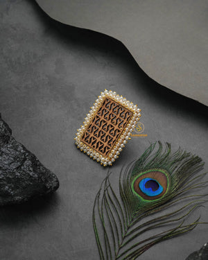 Bold metallic golden glow ring with assertive glamorous appeal
