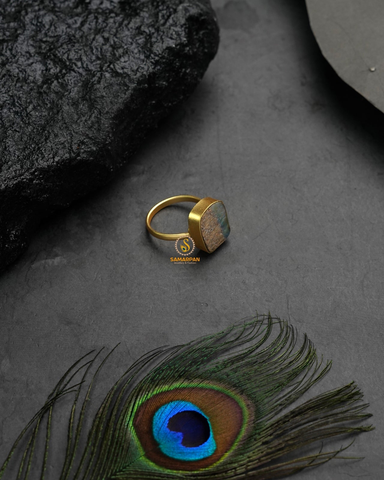 Bold metallic golden glow ring with assertive glamorous appeal