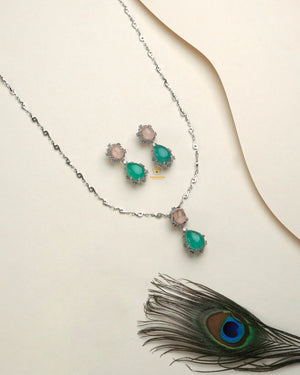 Skin Color Designer diamond collection pendant set styled for party wear