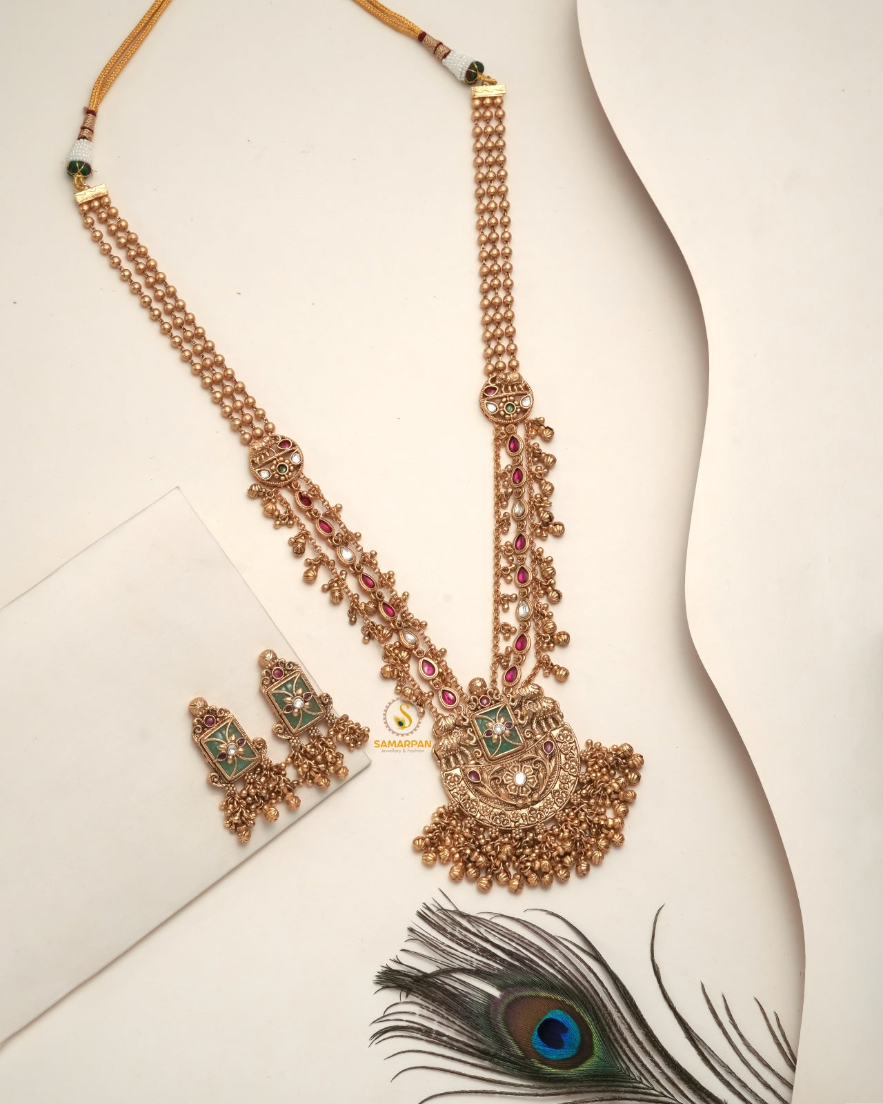 Royal Golden Heritage Pendant Set for Bridal Elegance styled in traditional golden jewellery display