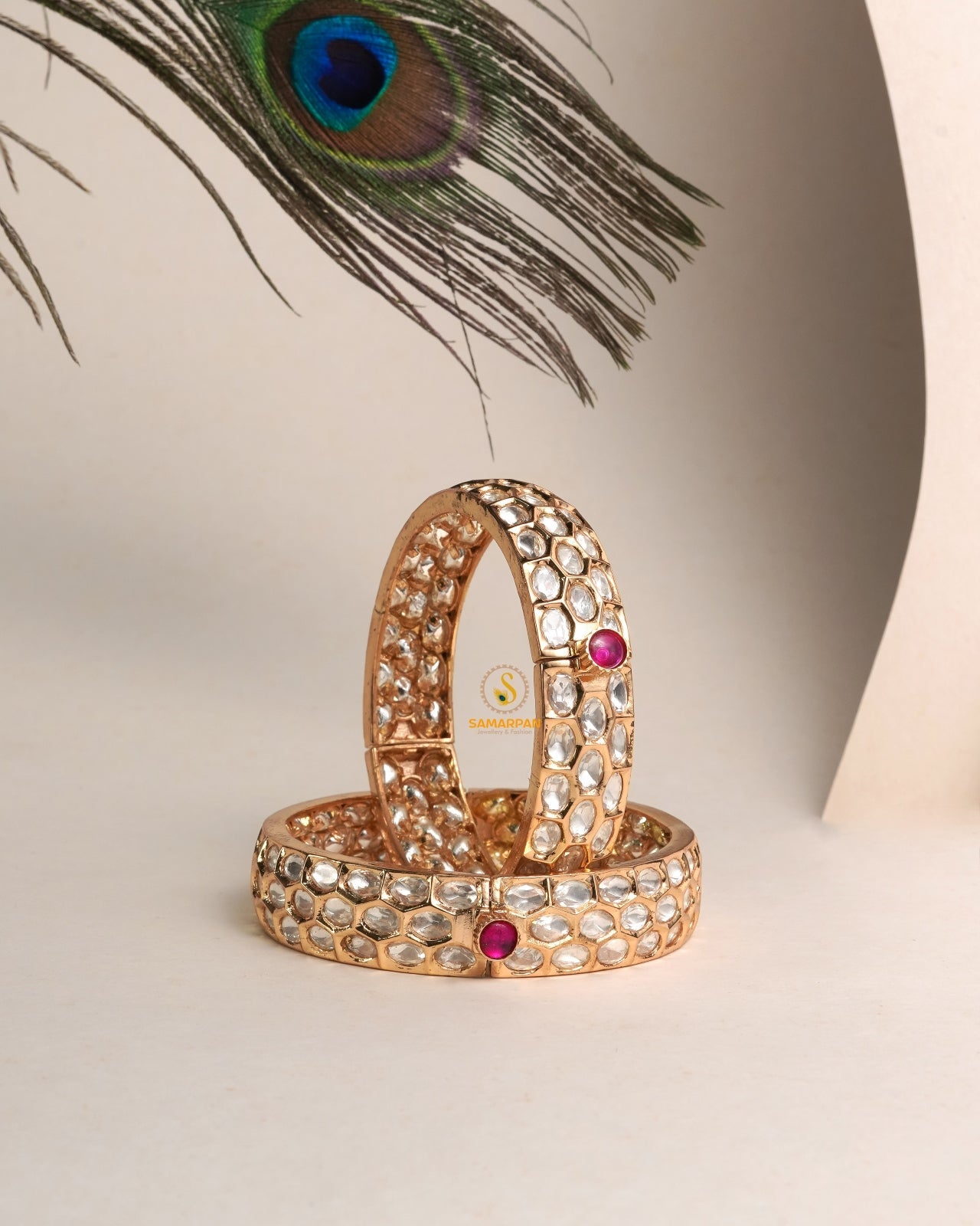 Royal-inspired polki bangles and traditional kangan designs in gold finish with intricate stone detailing for bridal and festive wear
